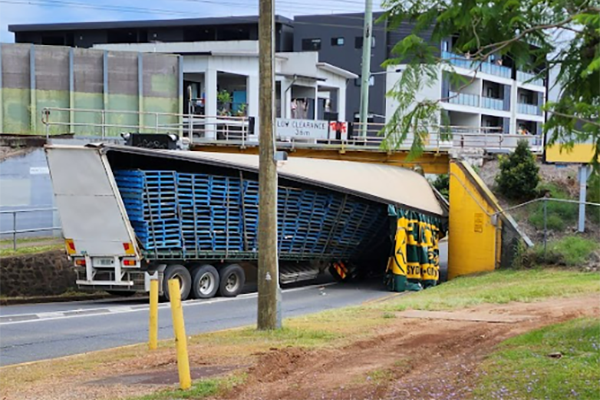 Article image for Overheight truck wedged underneath Oxley Road overpass