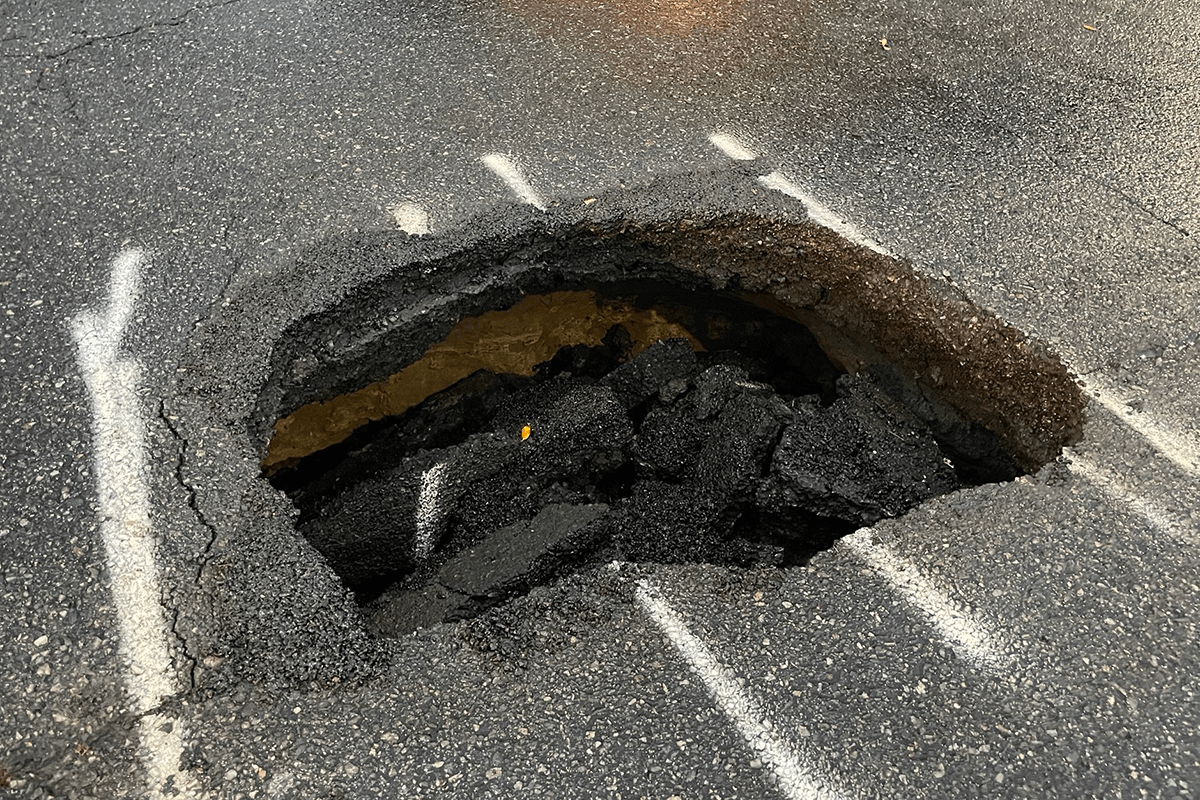 Article image for Coronation Drive reopens after sinkhole drama shut down road 