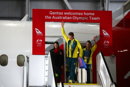 ‘A magnificent morning’: Australia’s Olympians touch down in Sydney