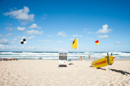 ‘Stay safe’: Queenslanders warned to swim between the flags this Christmas